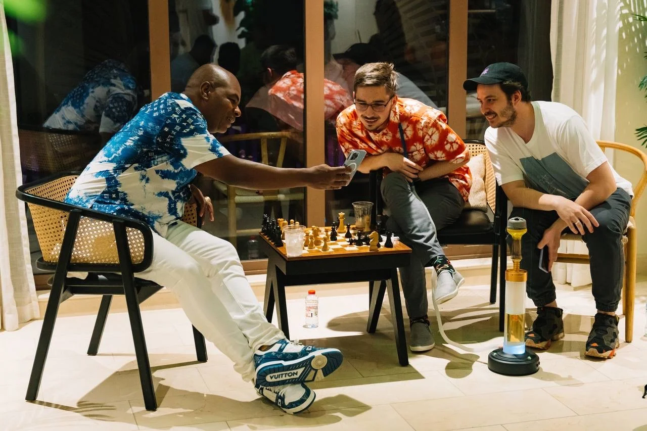 Team playing chess in the office