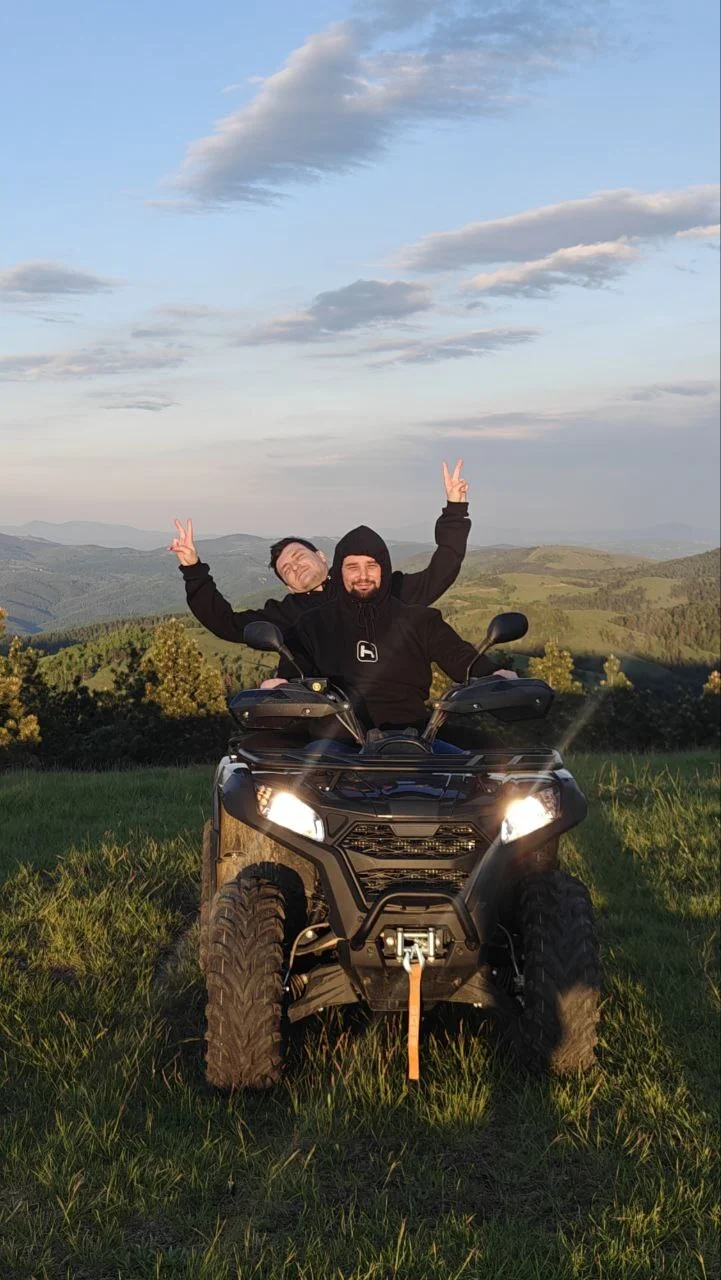 Team members on ATVs