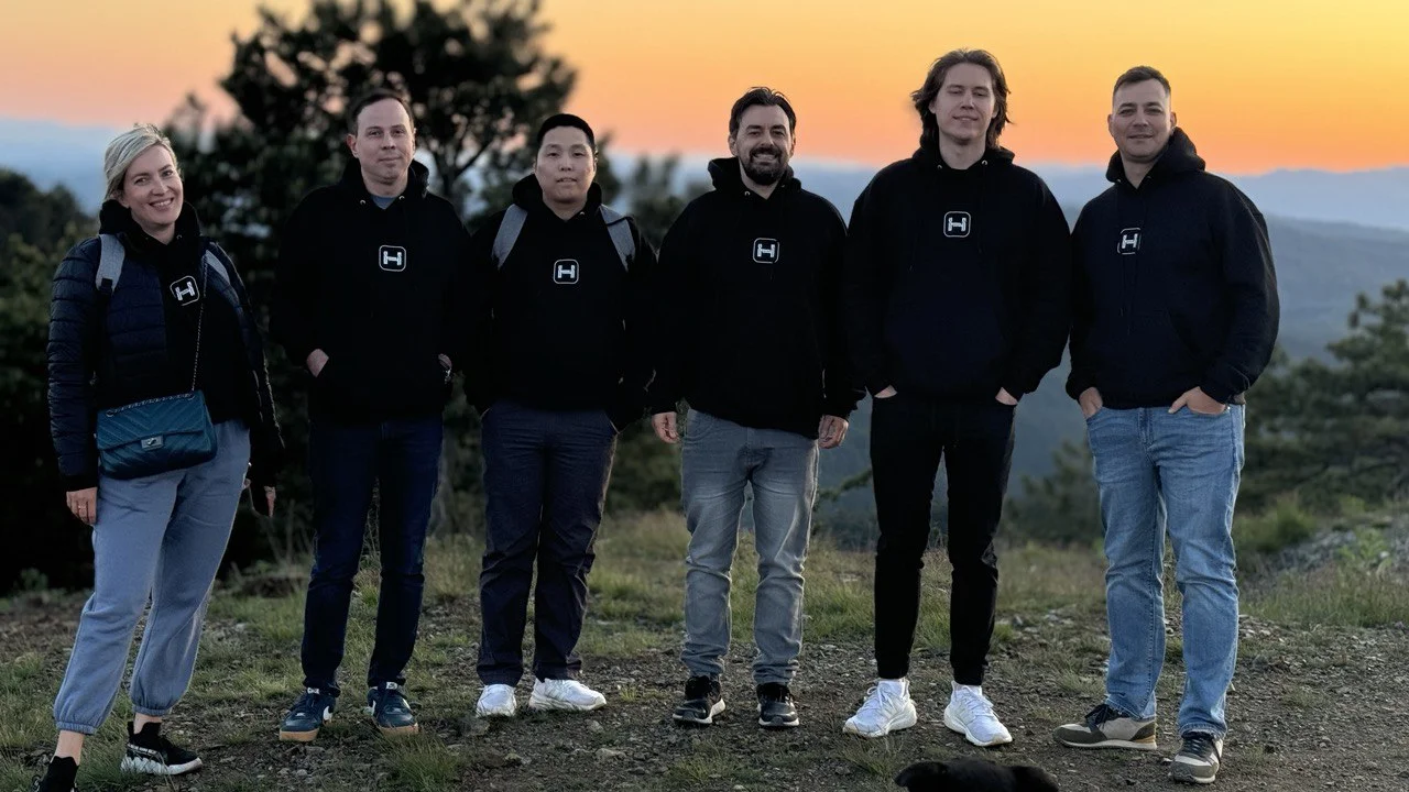 Team photo at sunset outdoors