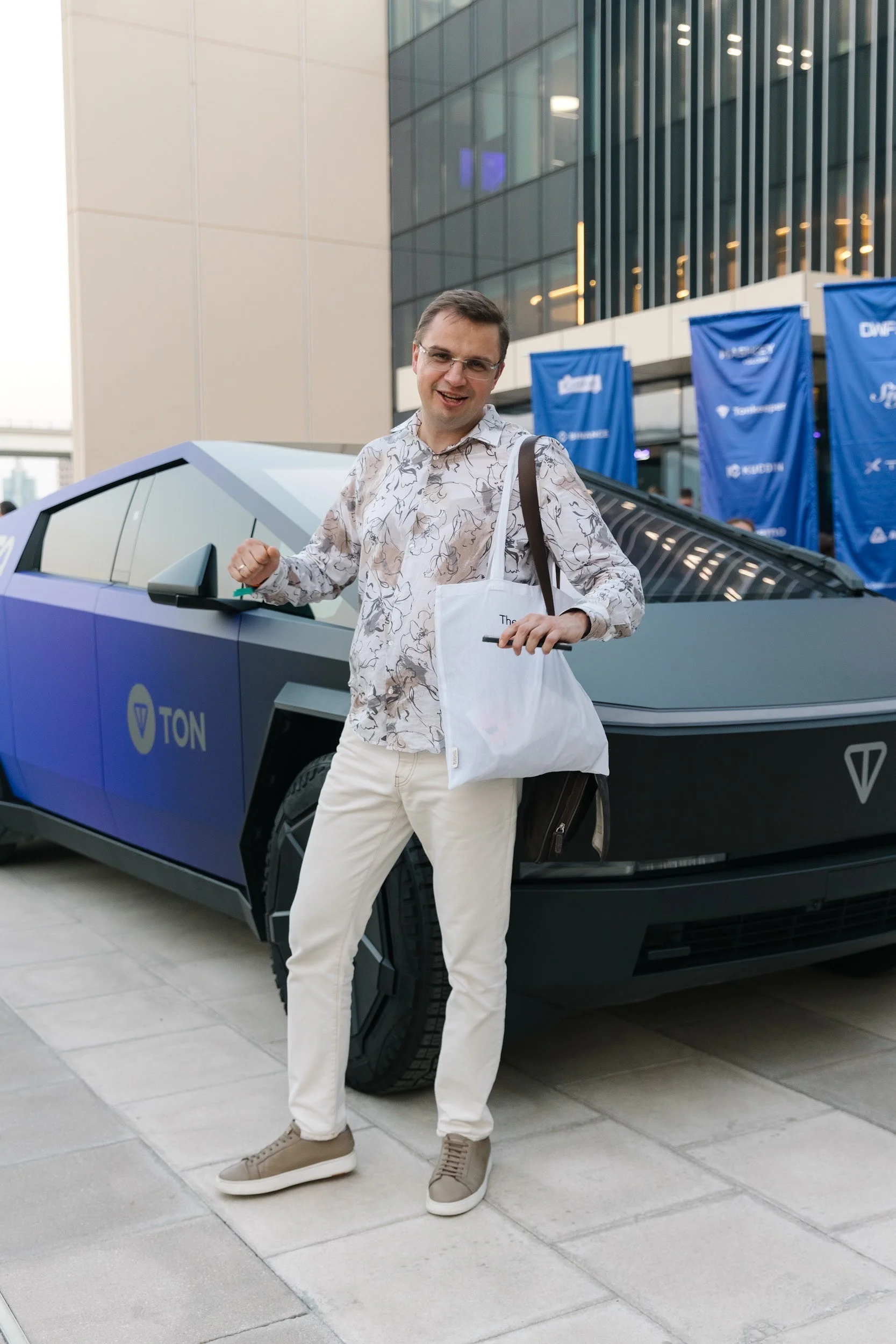 Team member with a TON car